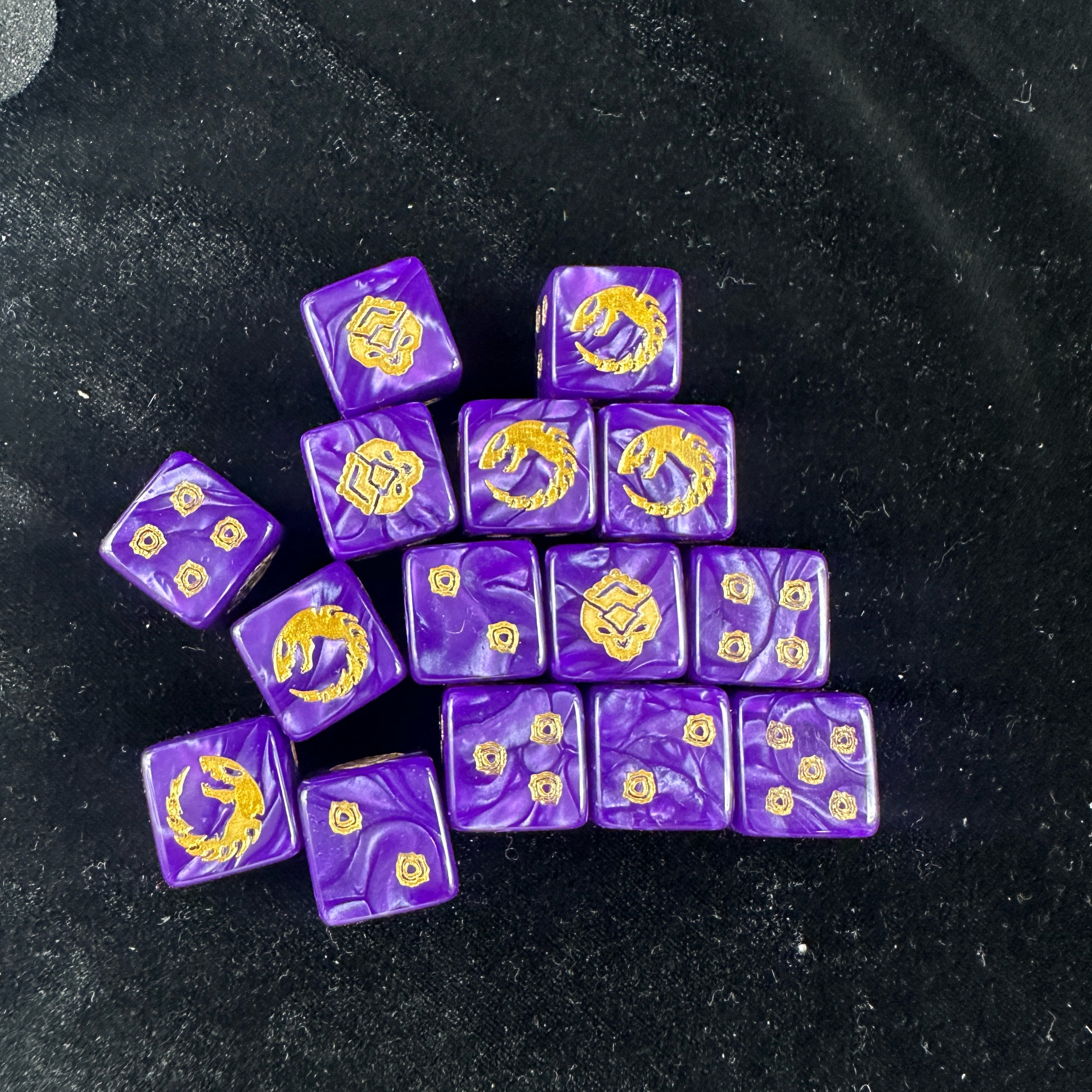 Genestealer Cults Ouroboros D6 Dice — Scattered Display of 15 Dice Showing All Gold Rune Faces: Ouroboros, Diamond Emblem and Faction Pip Icons on Purple Pearl Body | Bear Dice