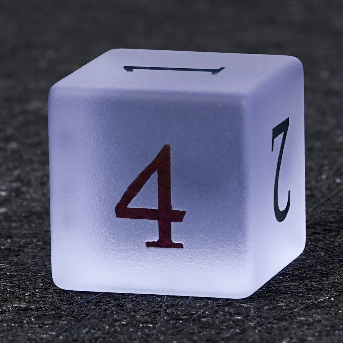 Translucent lavender gemstone D6 die with multicolored numbers, showing its cube shape and the number 4 on the front face