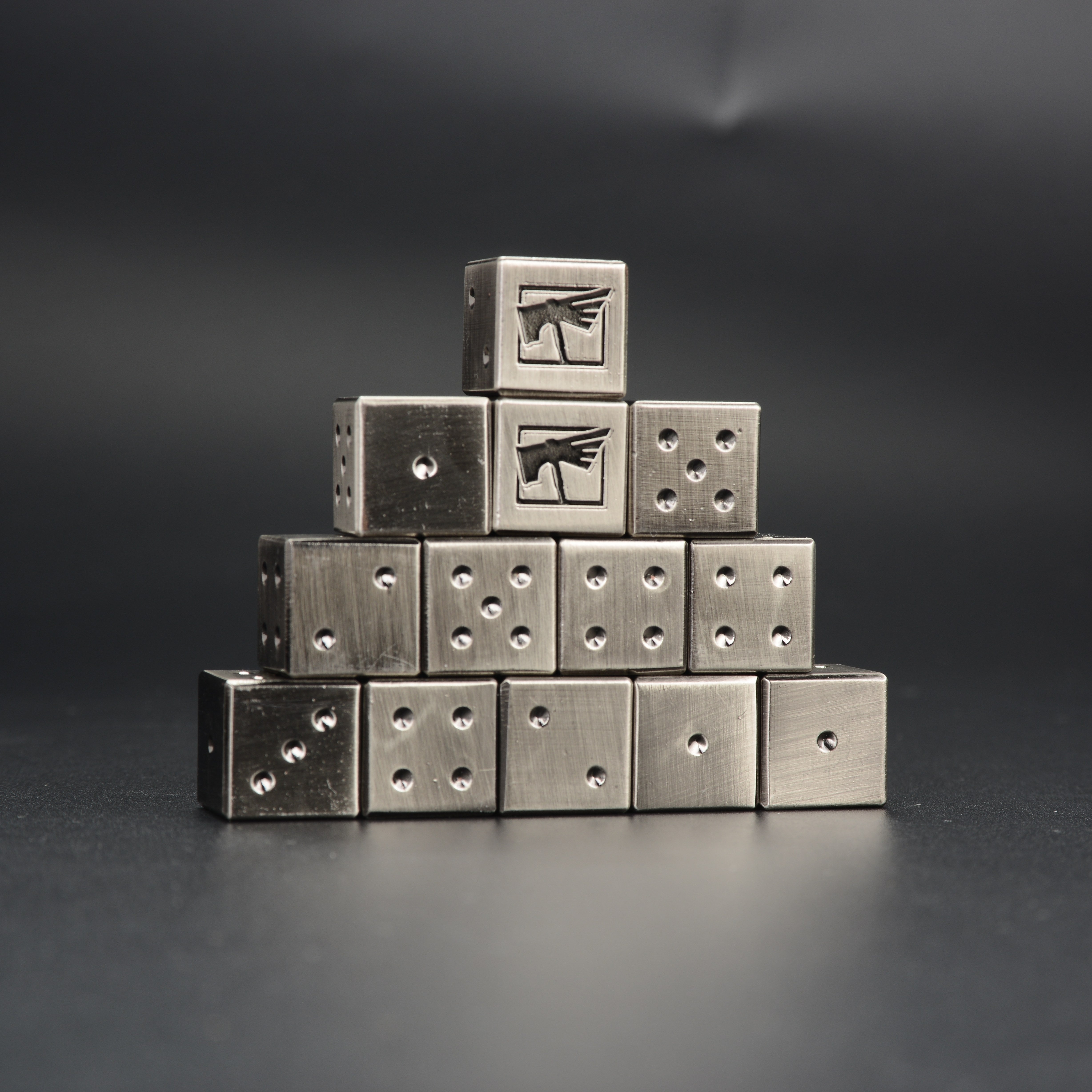 Metal Warhammer 40K D6 Dice 10-piece set stacked in pyramid formation brushed steel finish | Bear Dice
