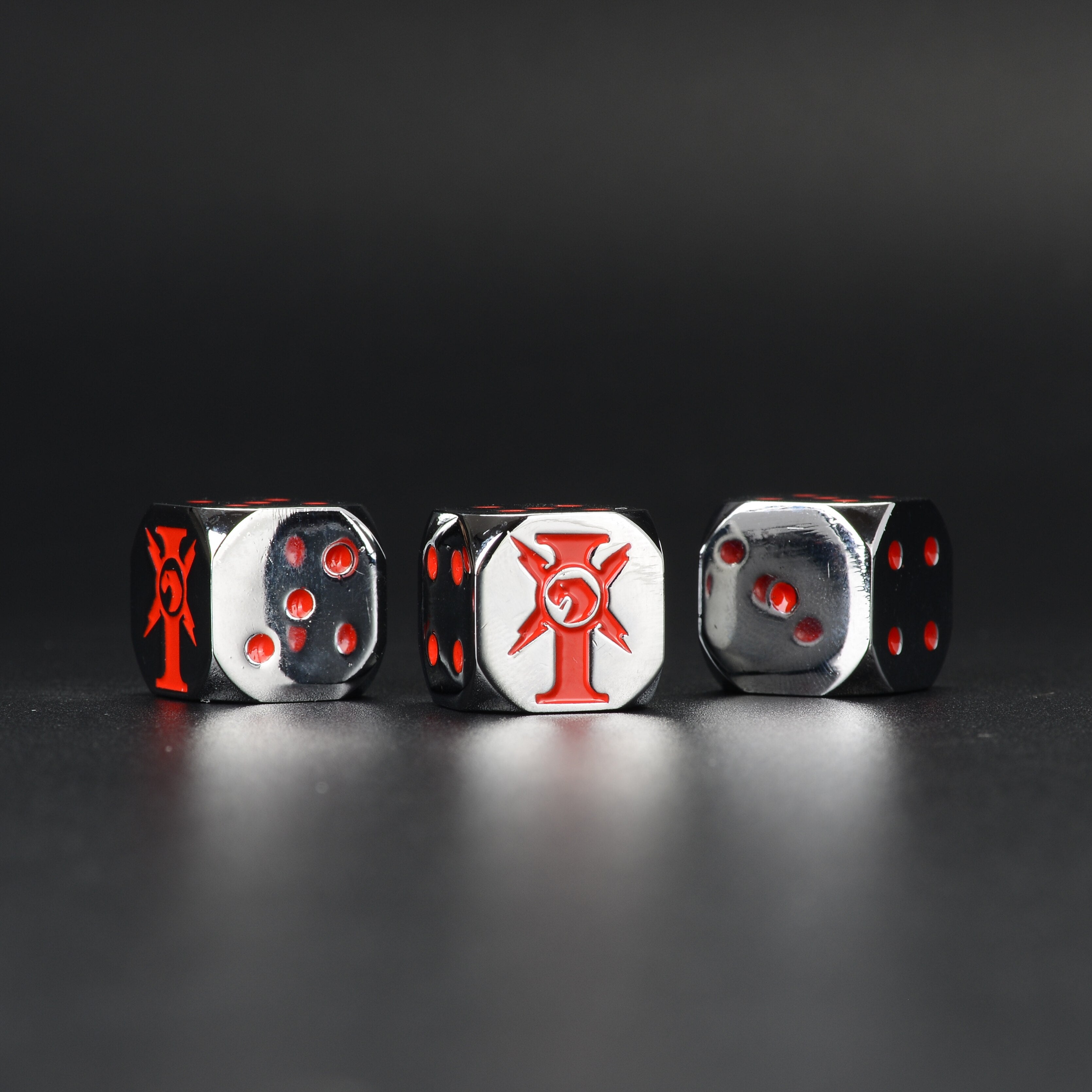 Warhammer 40K Imperial Chaos Star Metal D6 Dice — Three-Angle View Showing Chaos Star Face, Pip Sides and Chrome Finish | Bear Dice